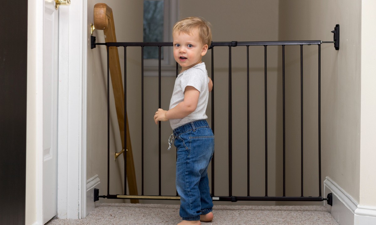 Appropriate Age To Teach Your Kid To Climb Stairs using a baby gate
