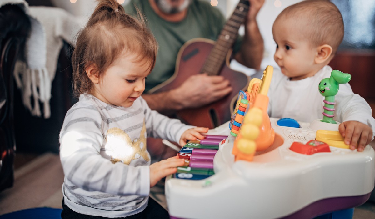 prepare your kids for playing instruments with a kick and play piano