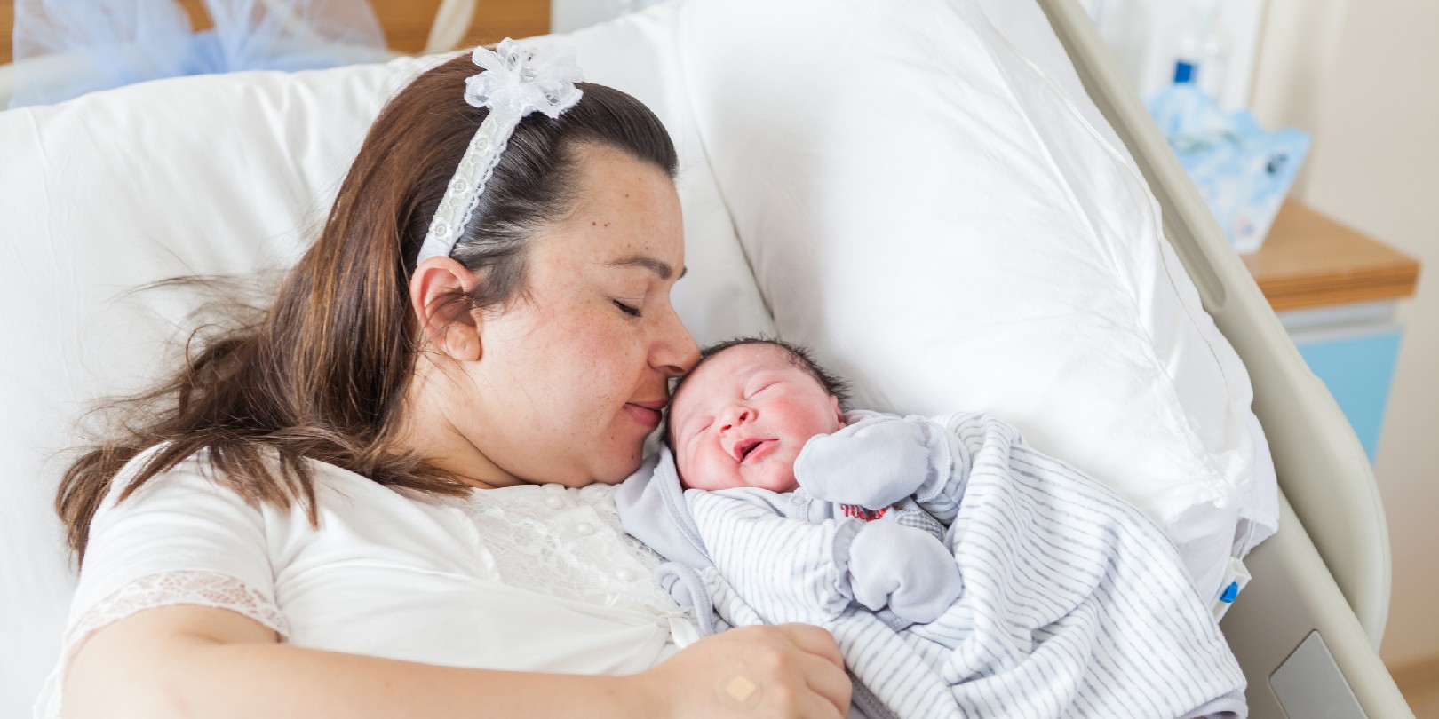 New born baby with his mother