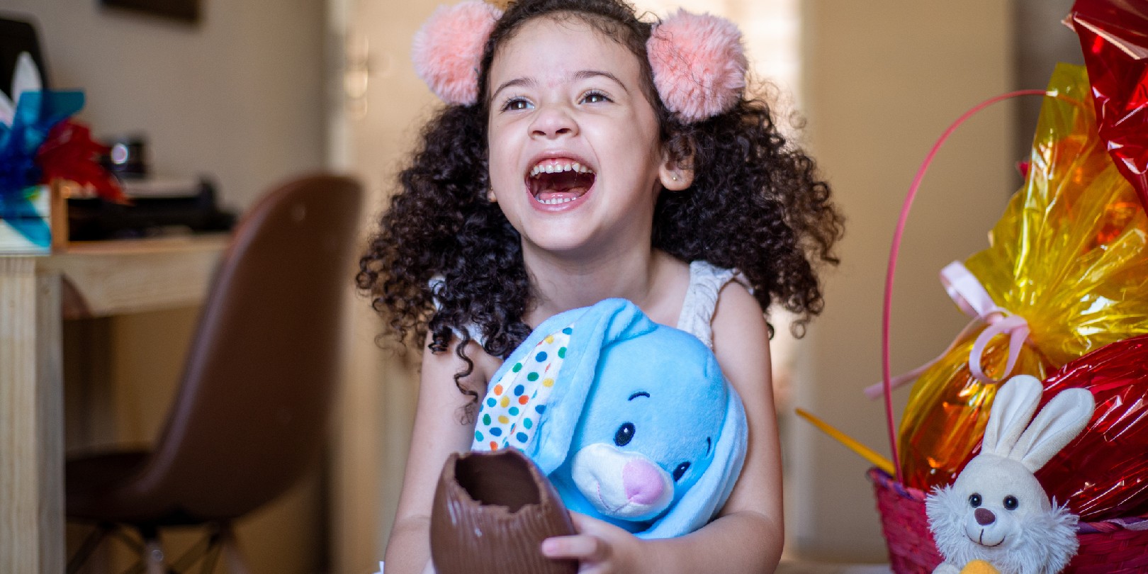 Girl opening chocolate Easter egg