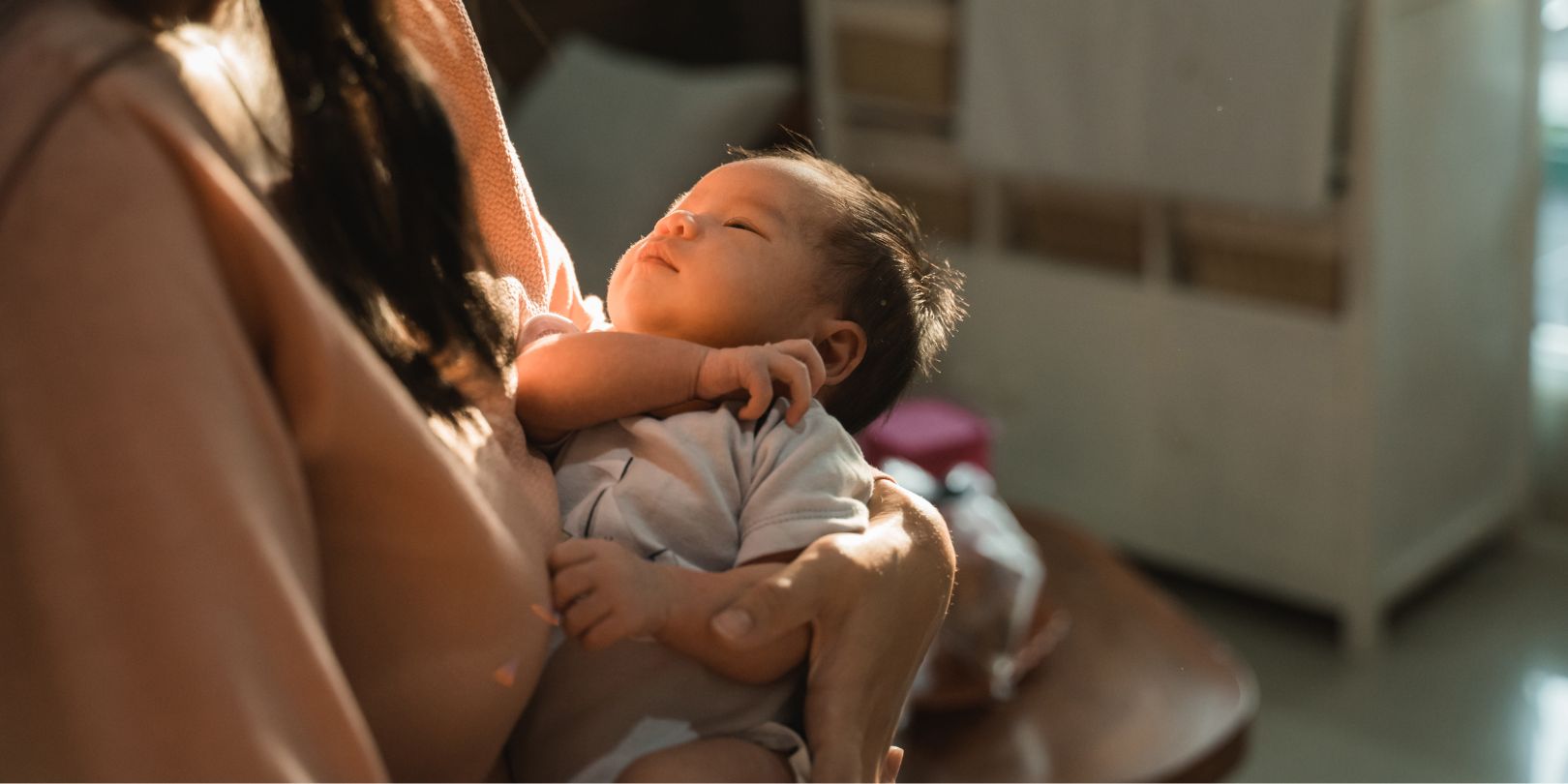 Little Baby Sleeping When Her Mother Carrying