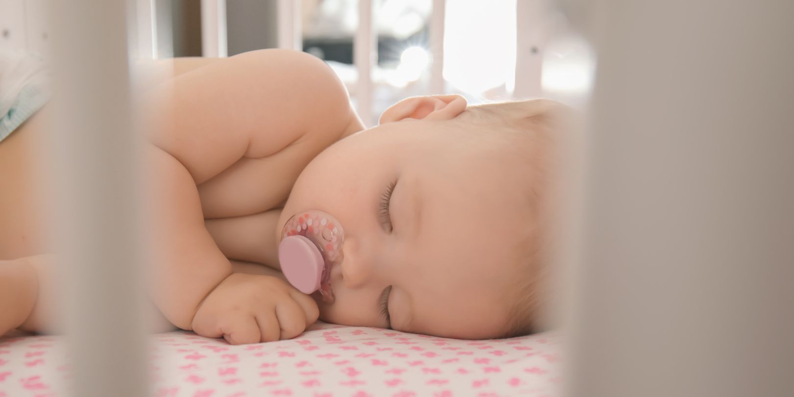 Cute Little Baby Sleeping in Crib