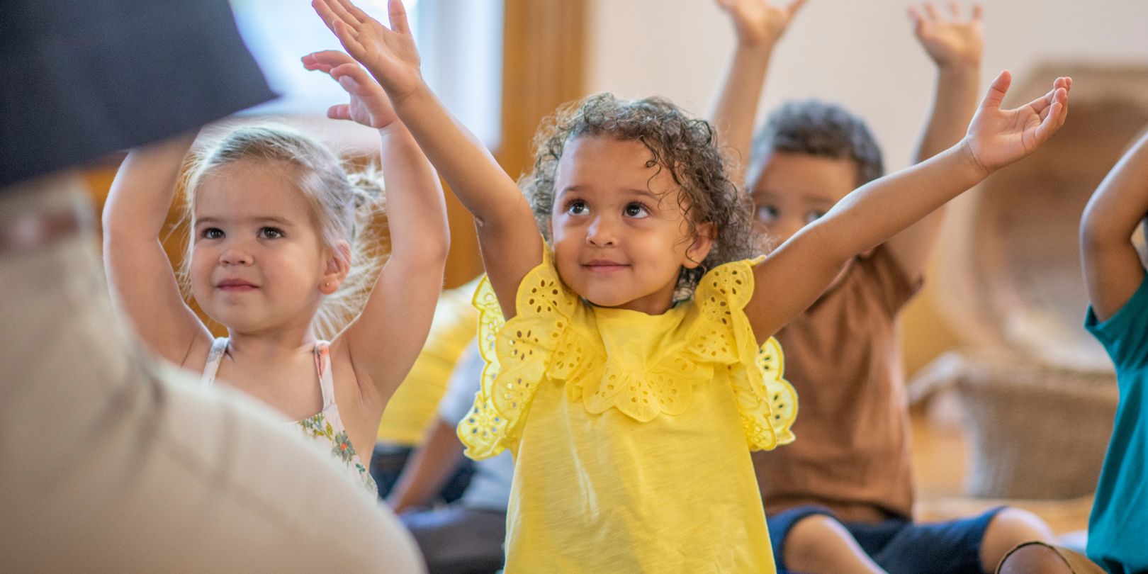 Preschool kids doing yoga