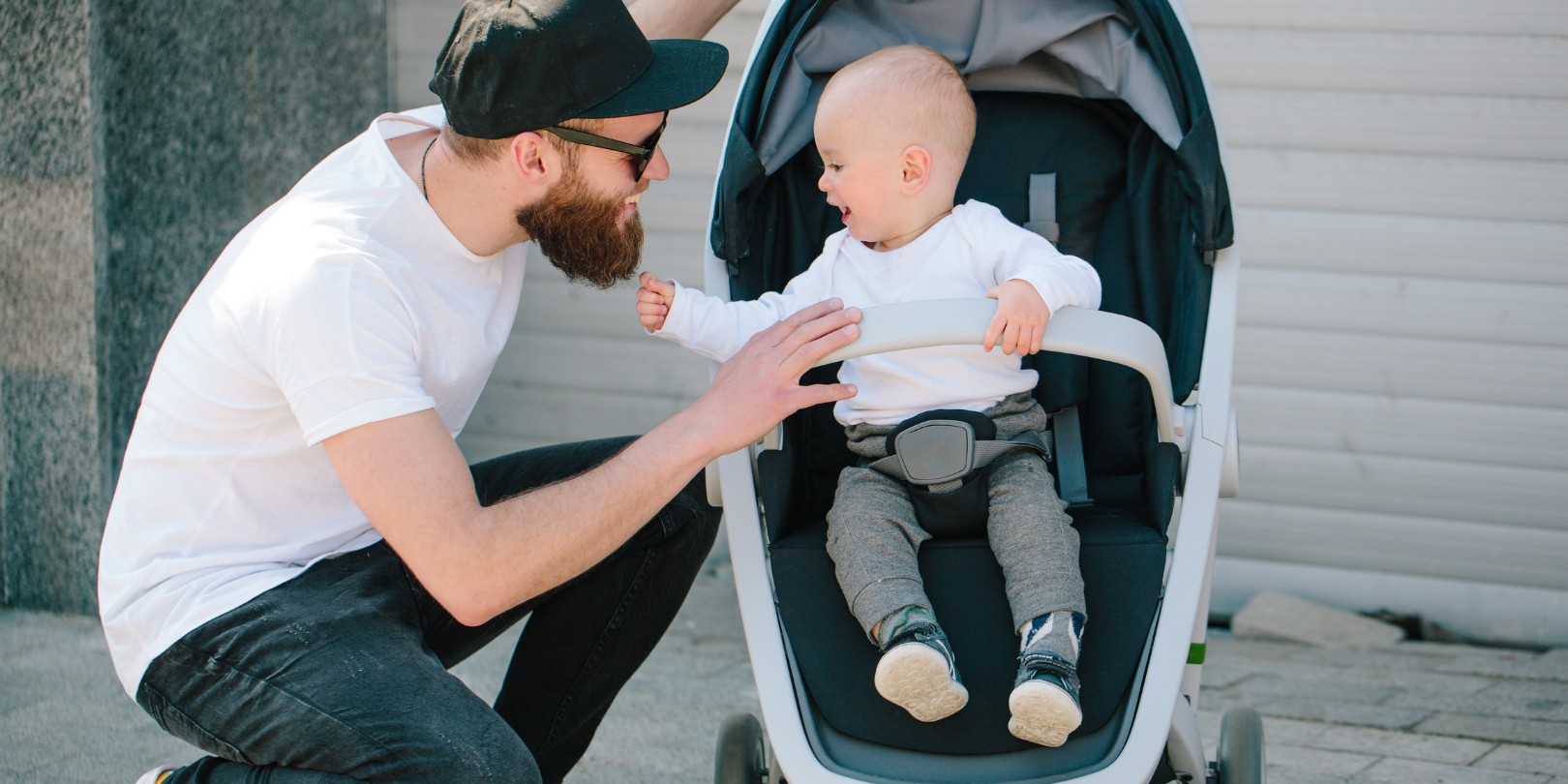 Father with Toddler on a Stroller