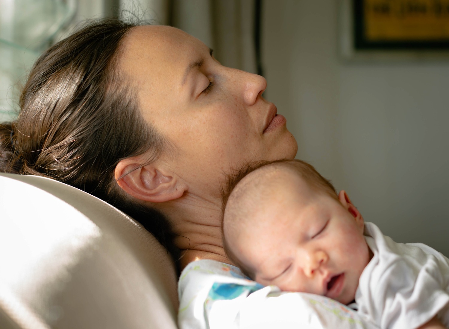 Sleeping mother and baby