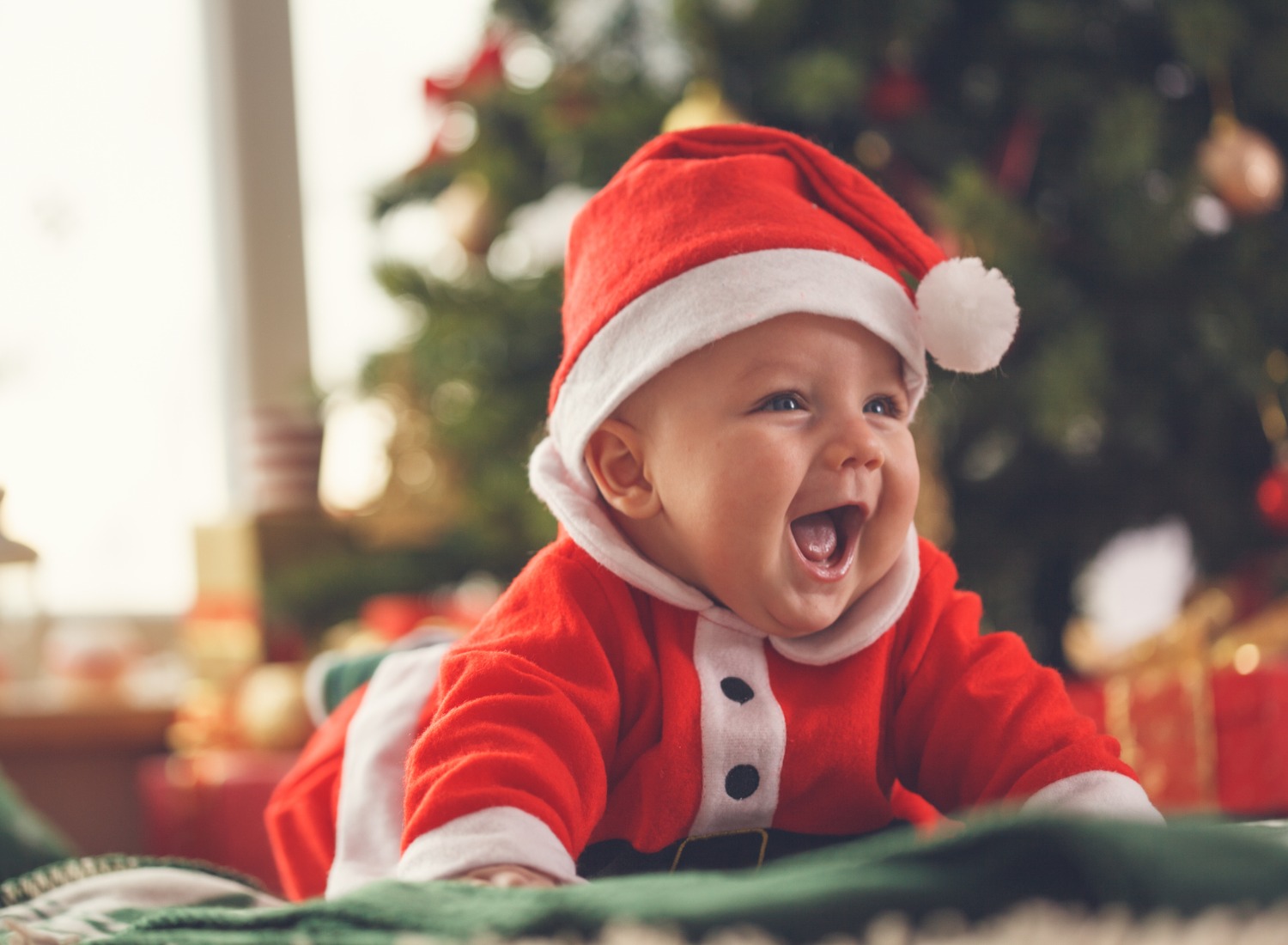 Baby in a santa outfit