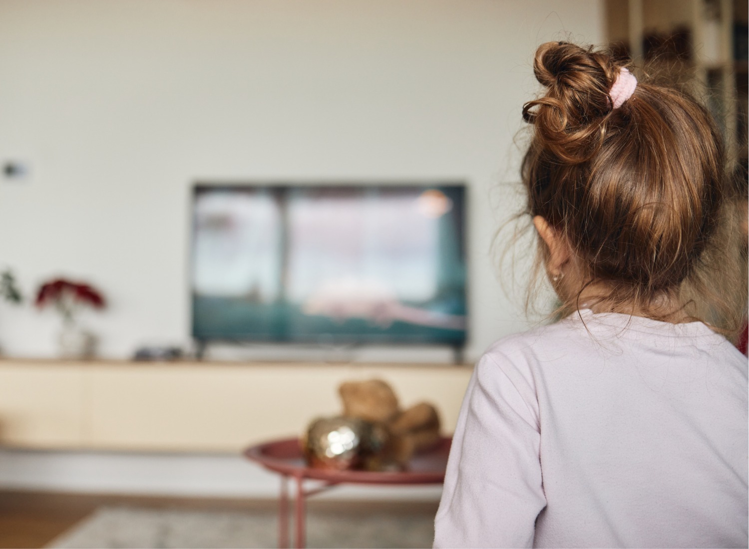 Little girl watching tv