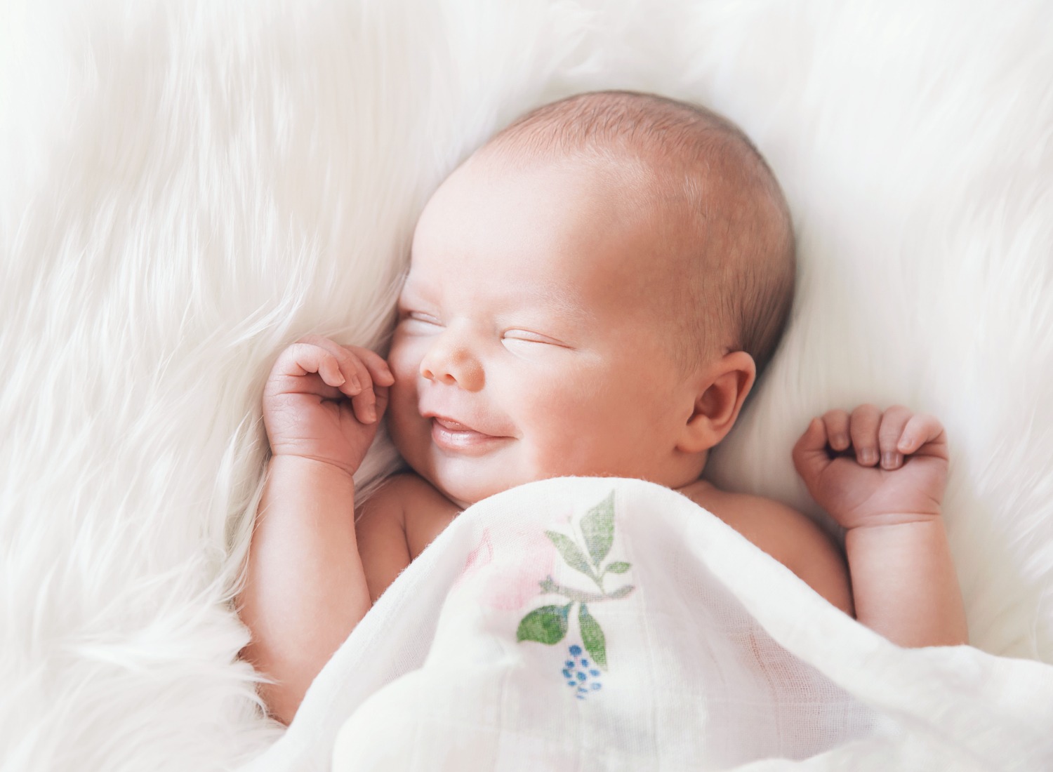 sleeping-newborn-baby-in-a-wrap-on-white-blanket.jpg_s=1024×1024&w=is&k=20&c=7NzAV69cjv11ekzSvTqle3uLcq9YeLP9HRUVDbi9PZ0= Newborn grinning while sleeping