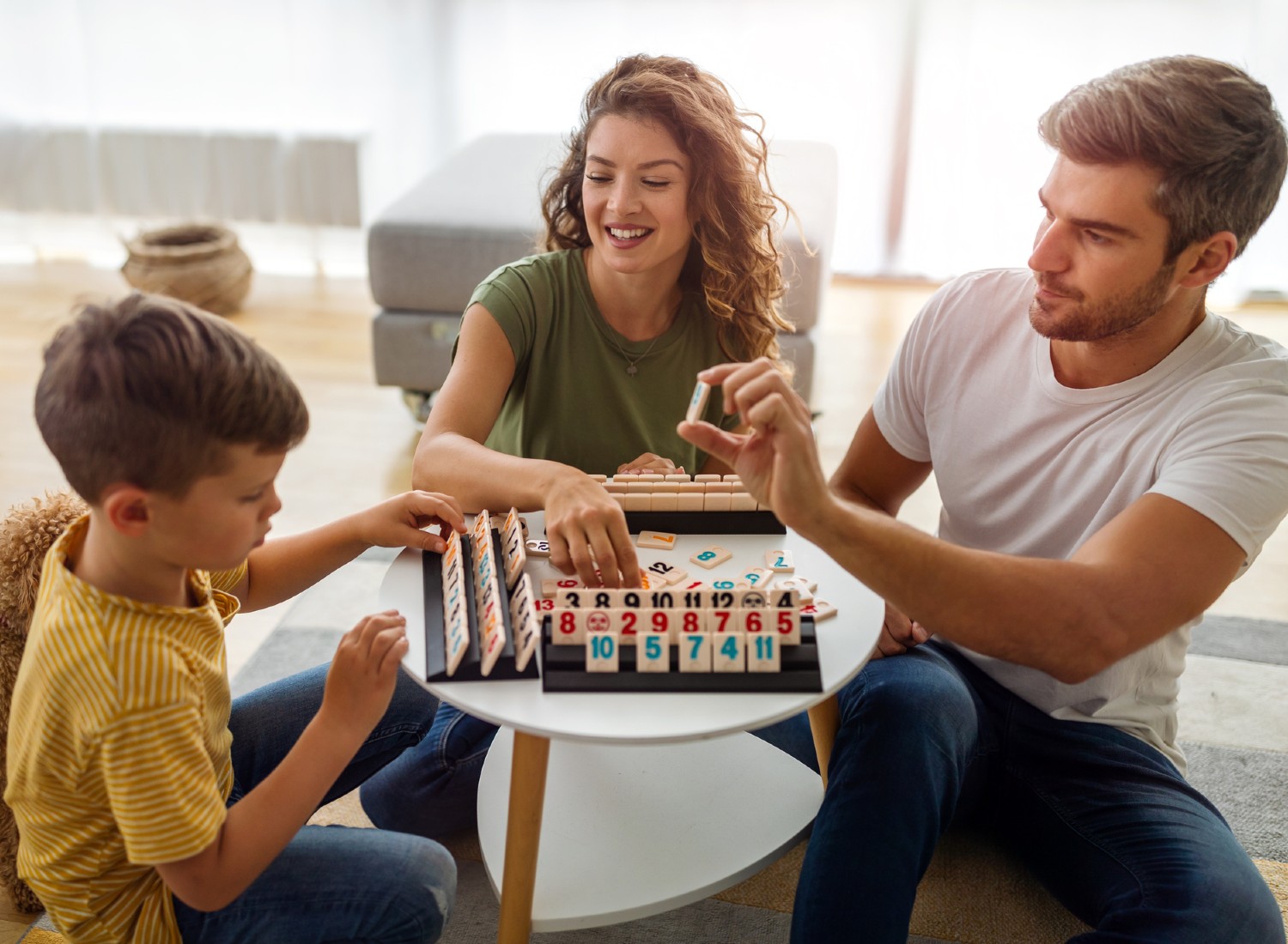 Family playing a board game