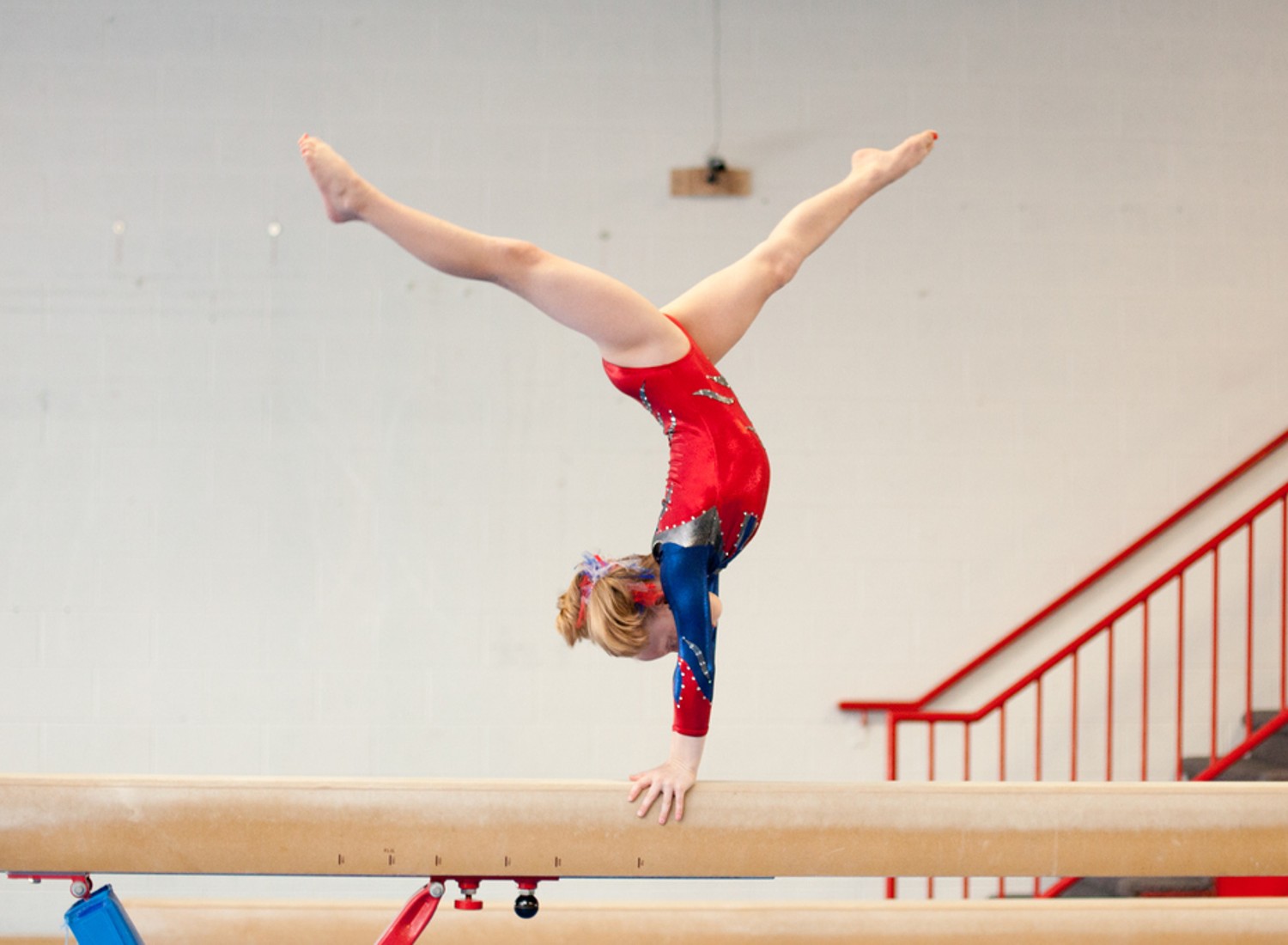 Child practicing gymnastics