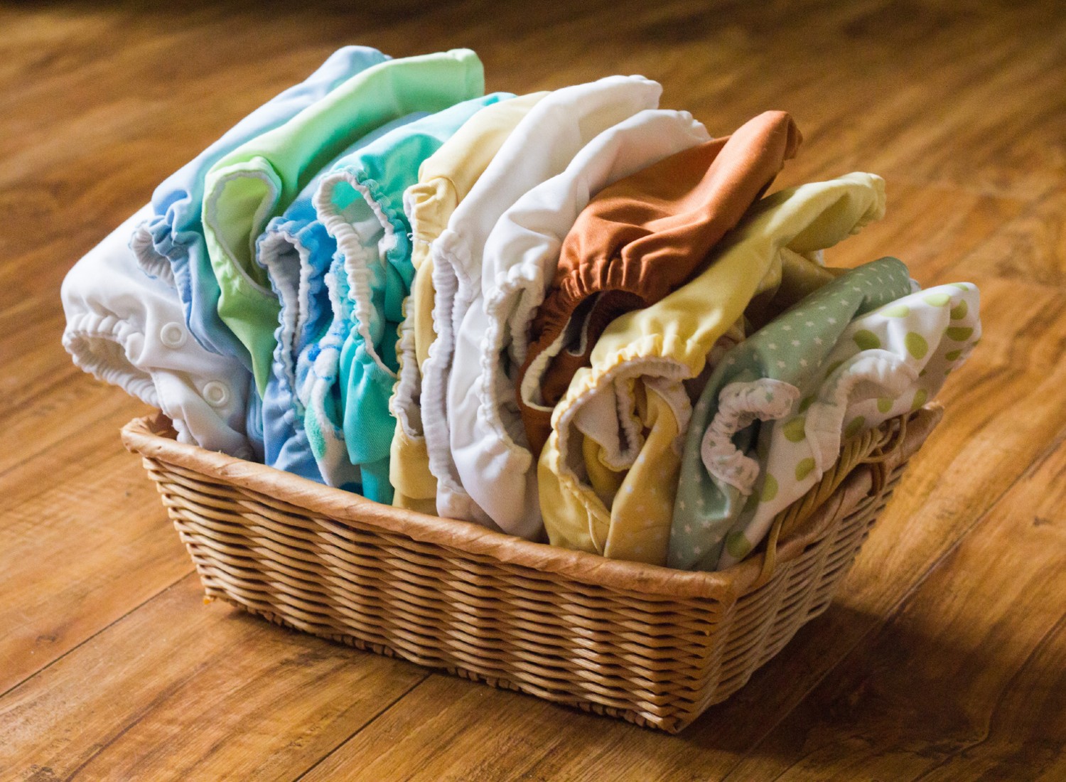 Basket full of cloth diapers